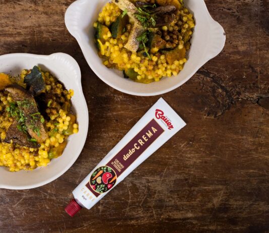 Fregula risottata alla zucca con polvere di caffè e funghi